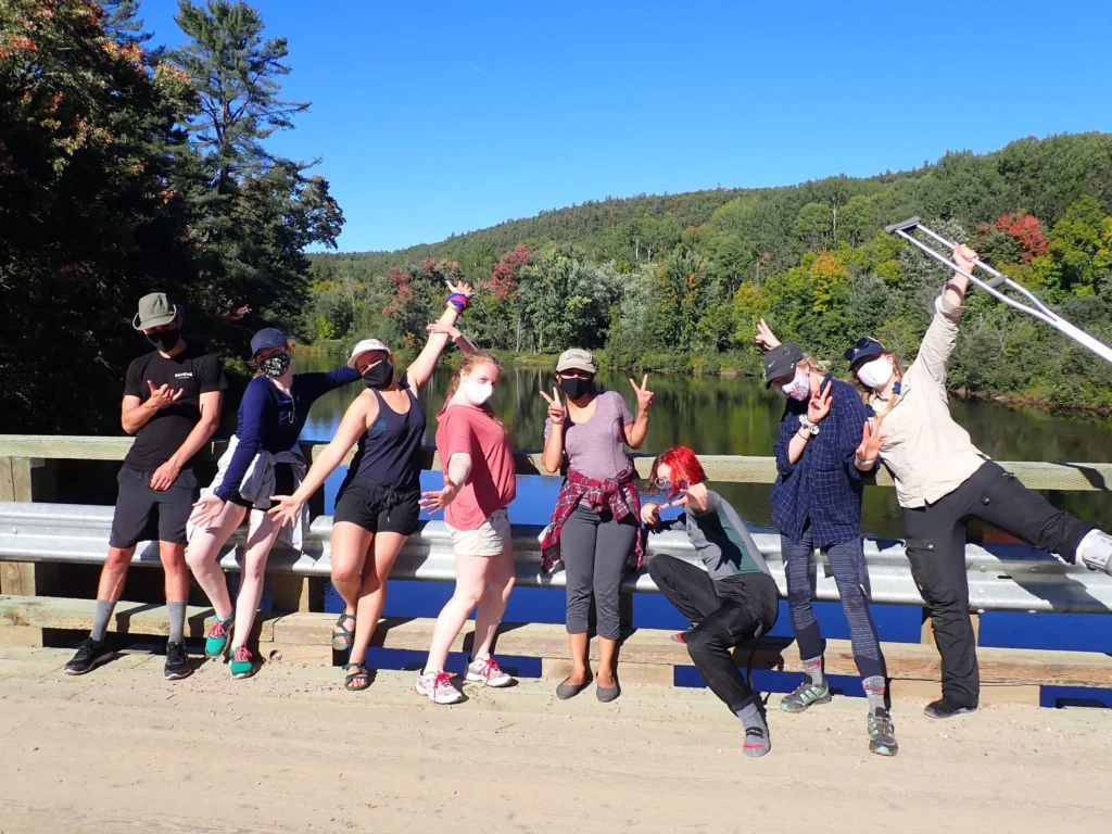 Group posing on a bridge