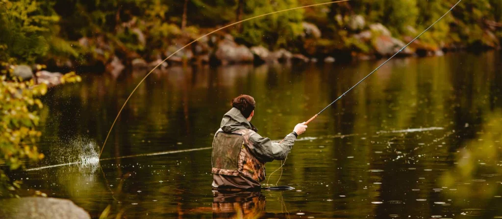 Men fishing in a river