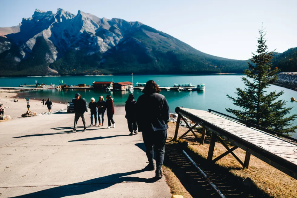 People walking to lake in Canada